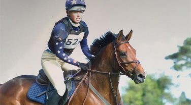 jockey riding horse